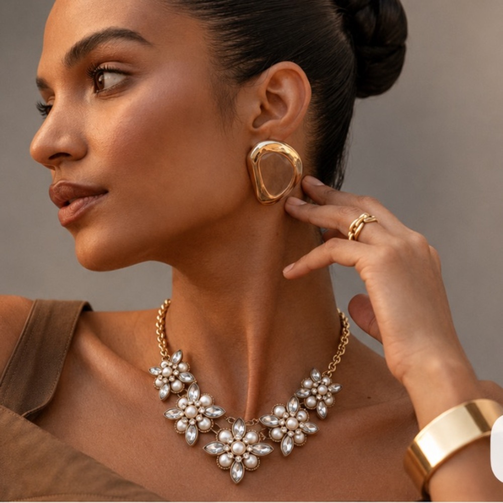 CHARMING CHARLIE Gold-tone White Bead
Rhinestone Scoop Necklace